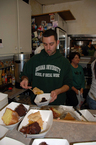 volunteer-serving-dinner-by-IndyDina-and-Mr-Wonderful.jpg