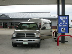 filling-up-gas-pickup-truck-trailer-by-NCreedplayer.jpg