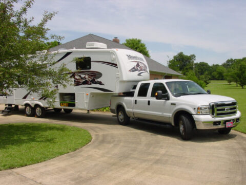 See how to hook up a fifth wheel trailer. 