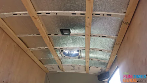 Furring strips on the ceiling are required to keep the second layer of insulation in place.