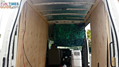 DIY wall paneling helps with soundproofing your cargo van.