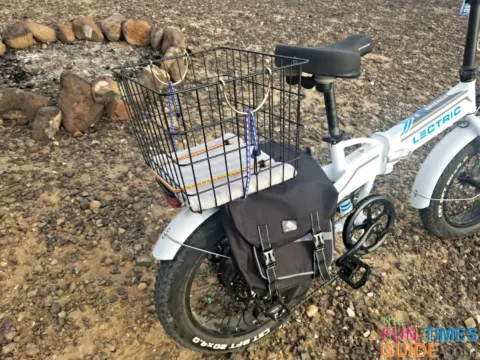 I added a wire basket from Walmart onto the back of my eBike -- so I can ride with my little dog.