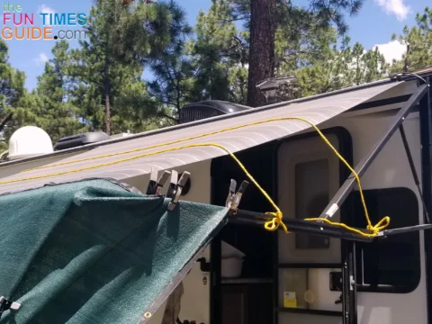The sun shade rope reinforces the RV awning fabric.