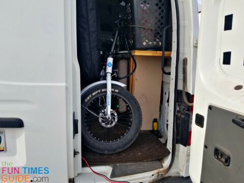 My RV electric bike tucked away in a corner of my van.