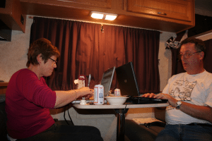 Using the RV dining table as office space while on the road. photo by margaritanitz on Flickr