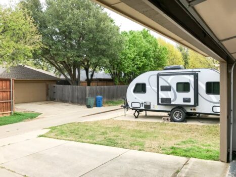 A poured concrete slab (instead of parking on grass) is best.