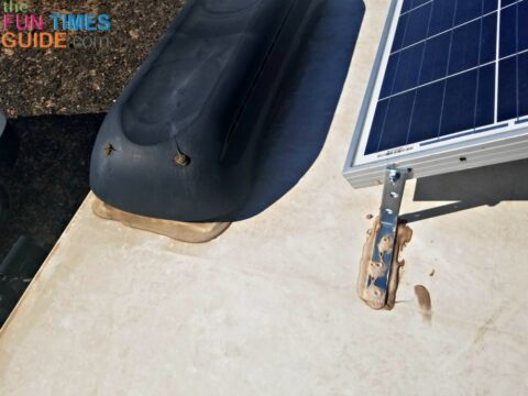 The RV refrigerator vent and solar mount on my travel trailer.