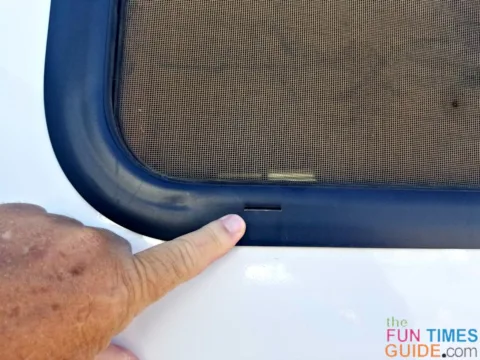 This is a weep hole on an RV window. It prevents water from accumulating inside the window track of your RV.